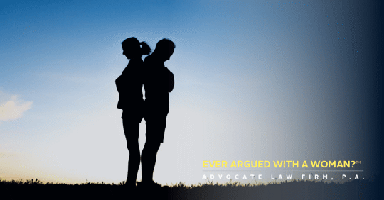 couple with backs to each other