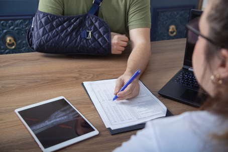injured person filling out forms