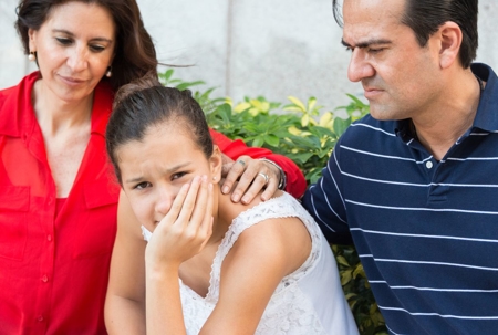 sad child and parent